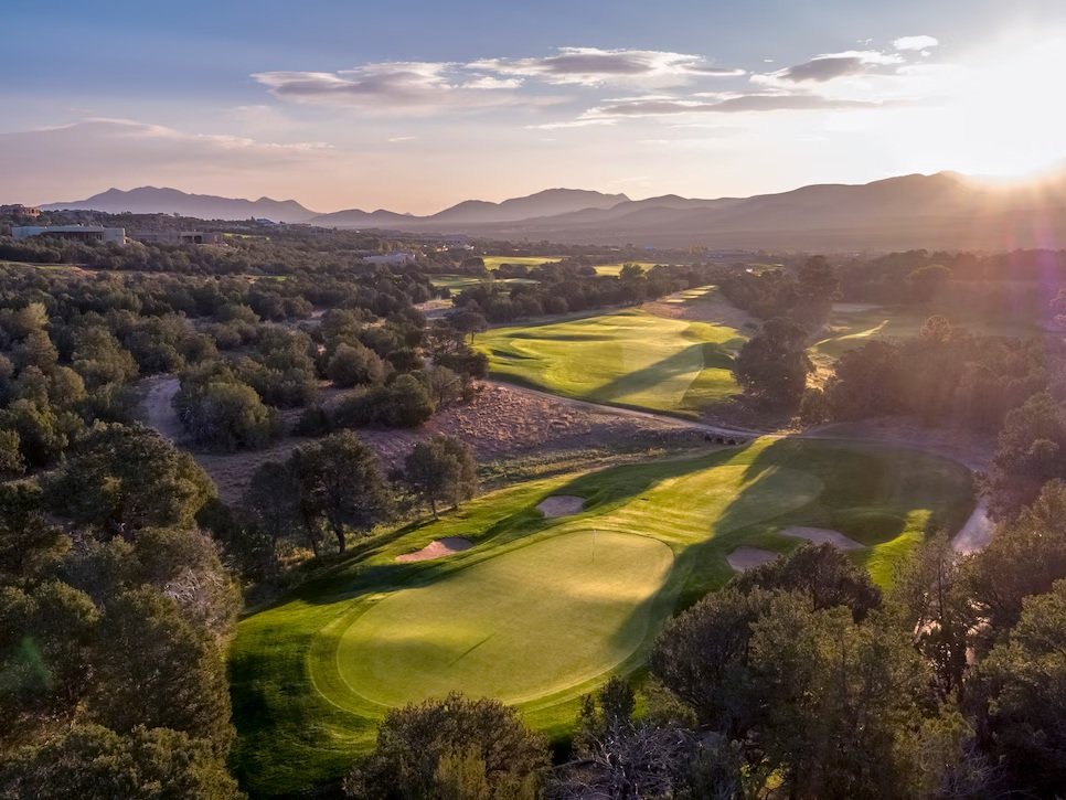 Aerial view of a Sun Country golf course in warm evening light
